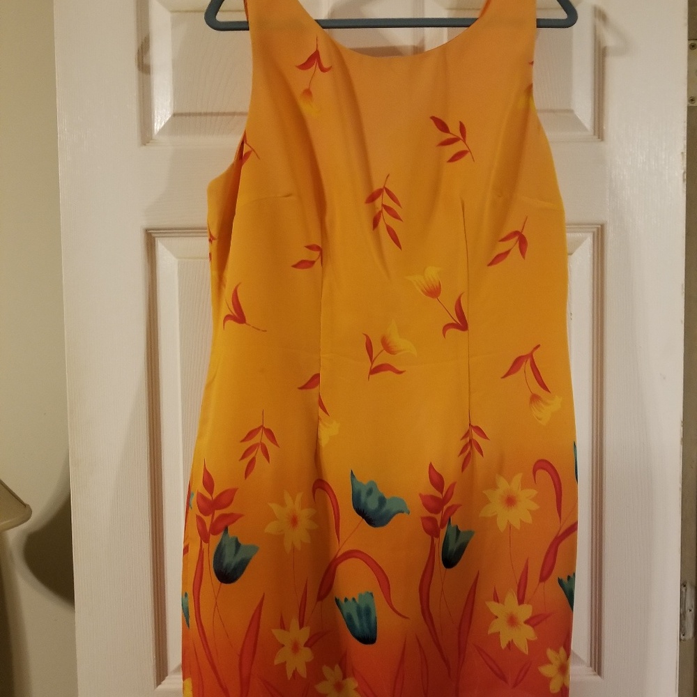 Pretty orange summer dress with teal flowers
